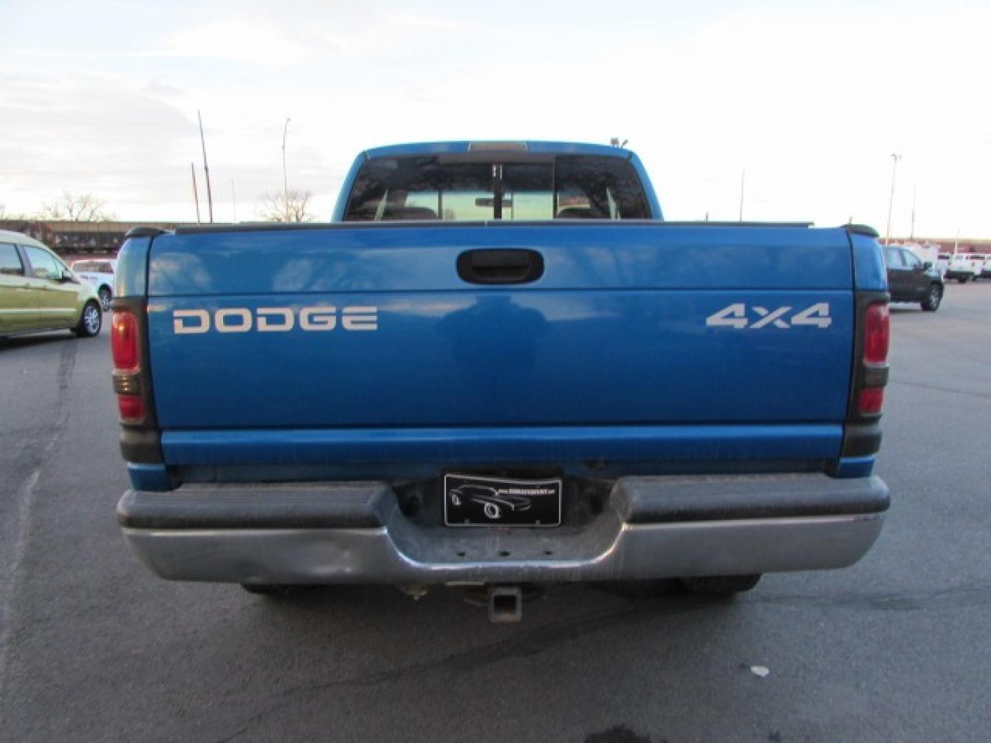 1999 Blue /Gray Dodge Ram 1500 SLT (3B7HF13Y9XG) with an 5.2 V8 Engine engine, 5 speed manual transmission, located at 4562 State Avenue, Billings, MT, 59101, (406) 896-9833, 45.769516, -108.526772 - Photo#2